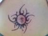tribal sun tattoos